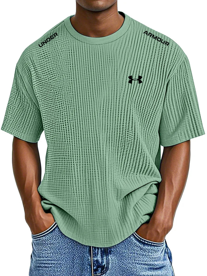 UNDER ARMOUR - Fritids-T-shirt med rund hals och präglat tryck