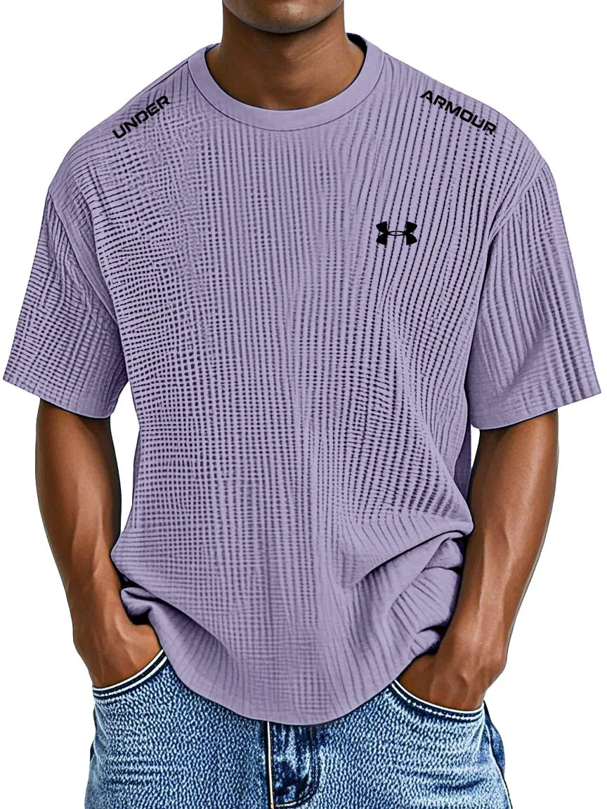 UNDER ARMOUR - Fritids-T-shirt med rund hals och präglat tryck