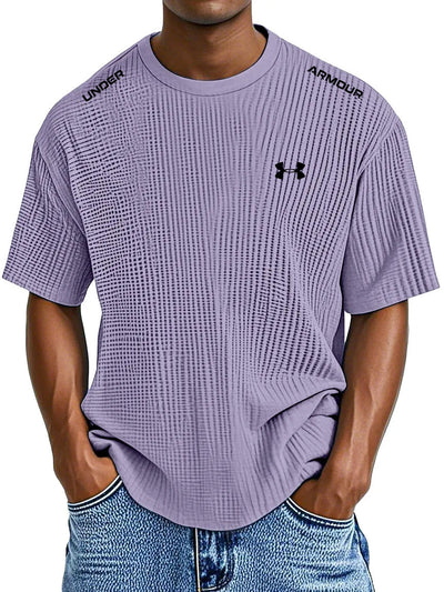 UNDER ARMOUR - Fritids-T-shirt med rund hals och präglat tryck