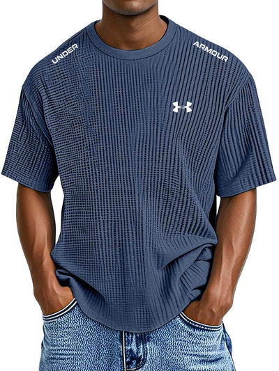 UNDER ARMOUR - Fritids-T-shirt med rund hals och präglat tryck